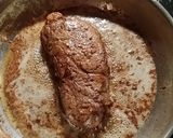 A picture of step 12 of Taisen's simple filet with onions.