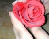 A picture of step 9 of Valentines day special fondant red rose cake topper.
