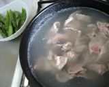 A picture of step 4 of Pork and Asparagus Tossed in Egg Yolk and Soy Sauce.