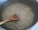 A picture of step 4 of Pineapple filled toasted coconut yellow rum cake..