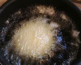 A picture of step 11 of Lotus Root Tempura Stuffed with Pork.