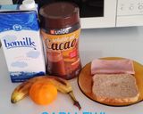 Foto del paso 3 de la receta: Desayuno caliente día 3>Leche con ColaCao>Tostada de jamón cocido>Mandarina y plátano