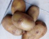 A picture of step 1 of Boiled potatoes in egg and Sauce.