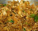 A picture of step 6 of Malaysian net crepes with Indian stuffed chicken.
