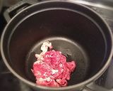 A picture of step 2 of Waterless Nikujaga (Simmered Meat and Potatoes) in a Staub Cocotte.