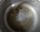 A picture of step 1 of Tomato peas pulao.