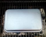 A picture of step 11 of Grill Baked Smore's Cake.