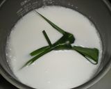 A picture of step 2 of Nasi Lemak (Rice Cooked in Coconut Milk).