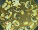 A picture of step 10 of Chicken stuffed with leeks & mushroom gravy.