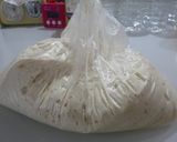 A picture of step 4 of Suprisingly Puffy Focaccia in a Plastic Bag.