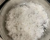 A picture of step 2 of Kue Putu Ayu (pandan coconut steam cake).