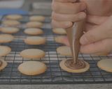 A picture of step 10 of Langue-de-chat Cookies (chocolate sandwich).
