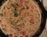 A picture of step 4 of Tortellini Alfredo Spinach and Tomato.