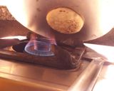 A picture of step 6 of Cheesy kulcha on tawa.