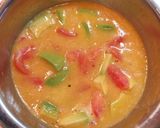 A picture of step 2 of White Miso Scrambled Eggs with Tomato and Avocado.