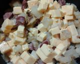 A picture of step 4 of Sautéed Sausage and Potatoes w/cheese.