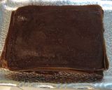 A picture of step 8 of Cocoa Crepe Roll Cake with Whole Strawberries.