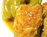 A picture of step 12 of Juicy Stuffed Bell Peppers with Sweet and Savory Pork.