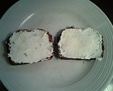 A picture of step 2 of Grilled Ham and Cheese Sandwiches on Date Nut Bread.