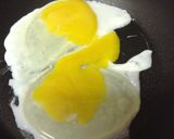 A picture of step 2 of Grilled Sausage Fried Egg And Cheese.