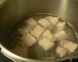 A picture of step 1 of Pressure Cooked, Meltingly Soft Simmered Pork and Daikon Radish.