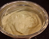 A picture of step 6 of Lemon Layer Cake with Blackberrie Cream Filling and a Lemon Cream Frosting.