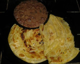 A picture of step 12 of Chapati (Soft, layered) served with coconut beans.