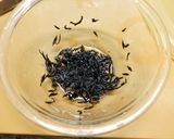A picture of step 1 of Rice Ball with Plum and Hijiki Seaweed.