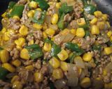 A picture of step 7 of Green Pepper and Corn Curry Stir-Fry.