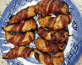 A picture of step 3 of Honey chicken wrapped in bacon.