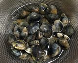 A picture of step 1 of The Colors of Spring Sublime Sake-Steamed Manila Clams.