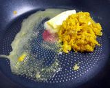A picture of step 1 of Turmeric Chicken Rice.