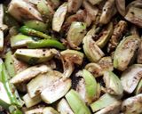 A picture of step 4 of Vankaaya Sanagala curry (brinjal black chana curry).