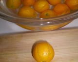 A picture of step 1 of Candied kumquats.