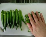 A picture of step 1 of Easy Pork-Wrapped Okra.