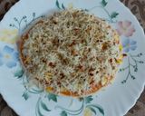 A picture of step 7 of Cheesy Mexican Veg Pizza.