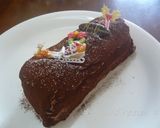 A picture of step 8 of Chocolate Cream Biscuit Cake.