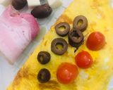 Foto del paso 5 de la receta: OMELET🌮(relleno de panceta ahumada, queso y aceitunas)🌮Y en homenaje al DÍA INTERNACIONAL DEL HUEVO🥚