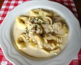 A picture of step 12 of Cheese and Nuts Cream Sauce Pasta.