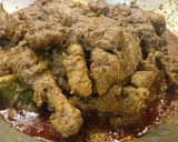 A picture of step 6 of Spicy asian chicken rendang.