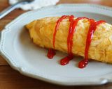 A picture of step 22 of Our Chicken Rice & Omurice.