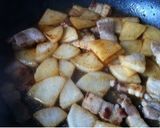 A picture of step 5 of Sweet and Spicy Braised Pork Belly with Daikon Radish.
