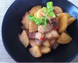 A picture of step 7 of Sweet and Spicy Braised Pork Belly with Daikon Radish.