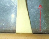 A picture of step 4 of Super Soft Butter Rolls in a Bread Maker.