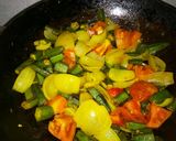 A picture of step 9 of #Ramadan.. Bhindi tometo de pyaza.