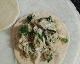 A picture of step 2 of Mooli ki parathi with achar aur butter.