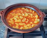 Foto del paso 8 de la receta Gambas al fish masala con patatas confitadas en fumet de gambas