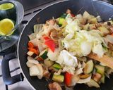 Une image de l'étape 4 de Courgettes farcies aux légumes.
