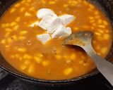A picture of step 11 of Corn paneer capsicum curry.