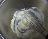 A picture of step 9 of Cocoa Crepe Roll Cake with Whole Strawberries.